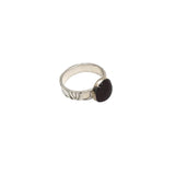 Nature inspired handmade ring with a natural garnet gemstone and sterling silver setting